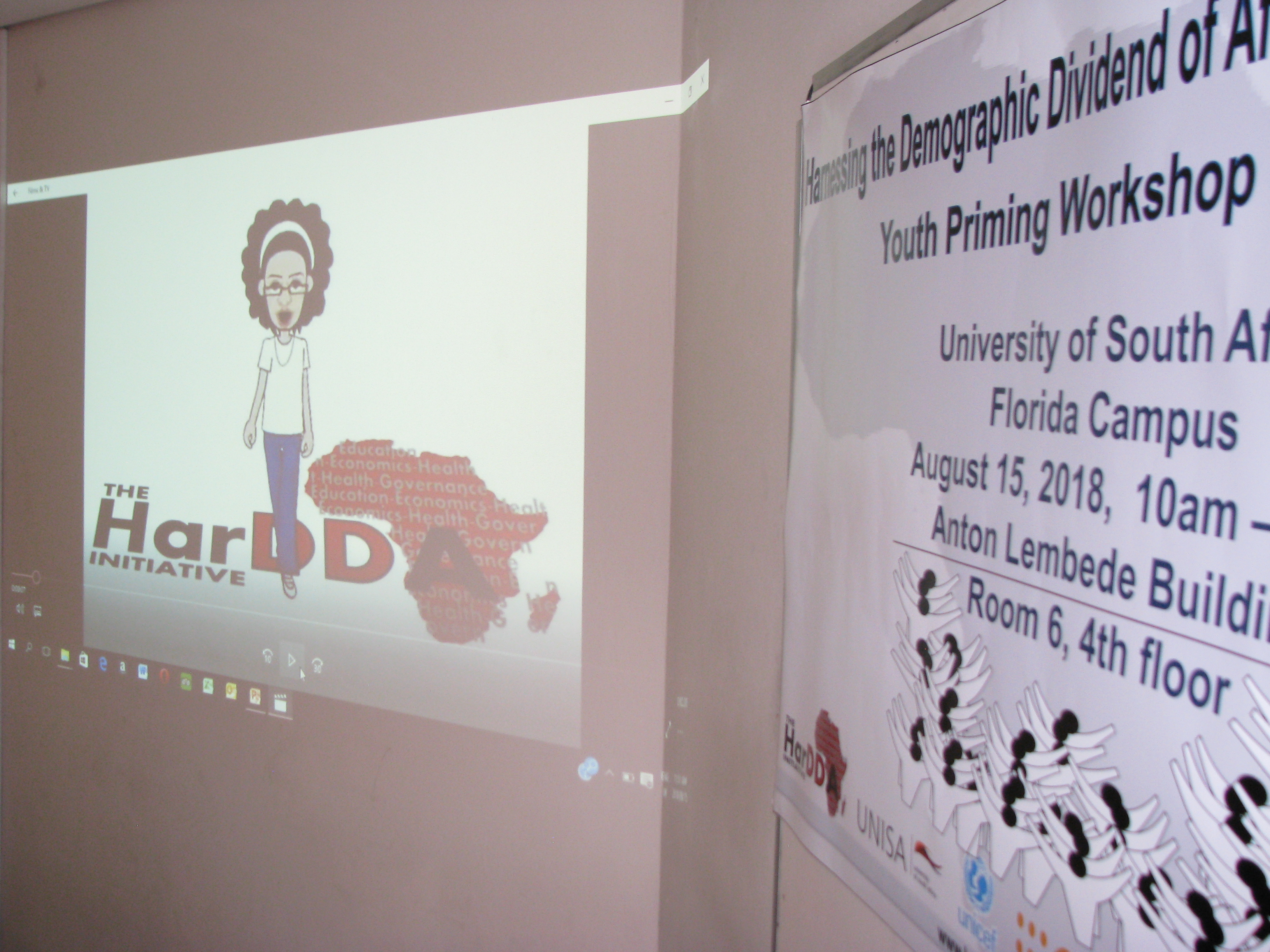 Mama HarDDA DD video being played at Workshop in University of South Africa